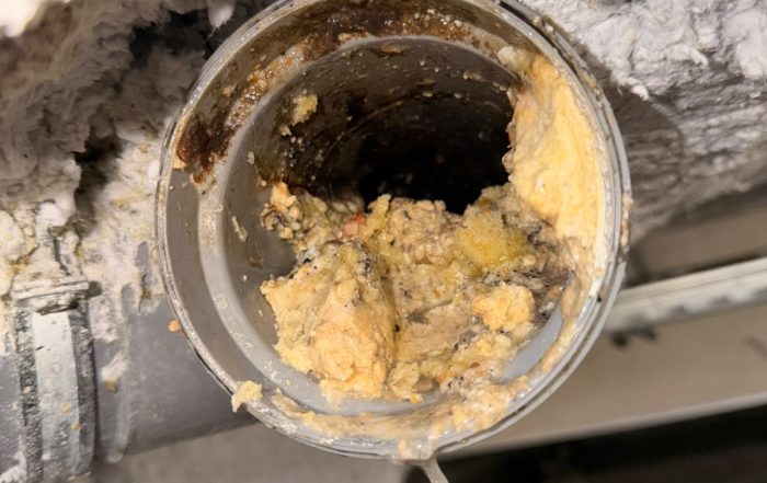 Curage haute pression d’une canalisation de cuisine d’immeuble à Annemasse